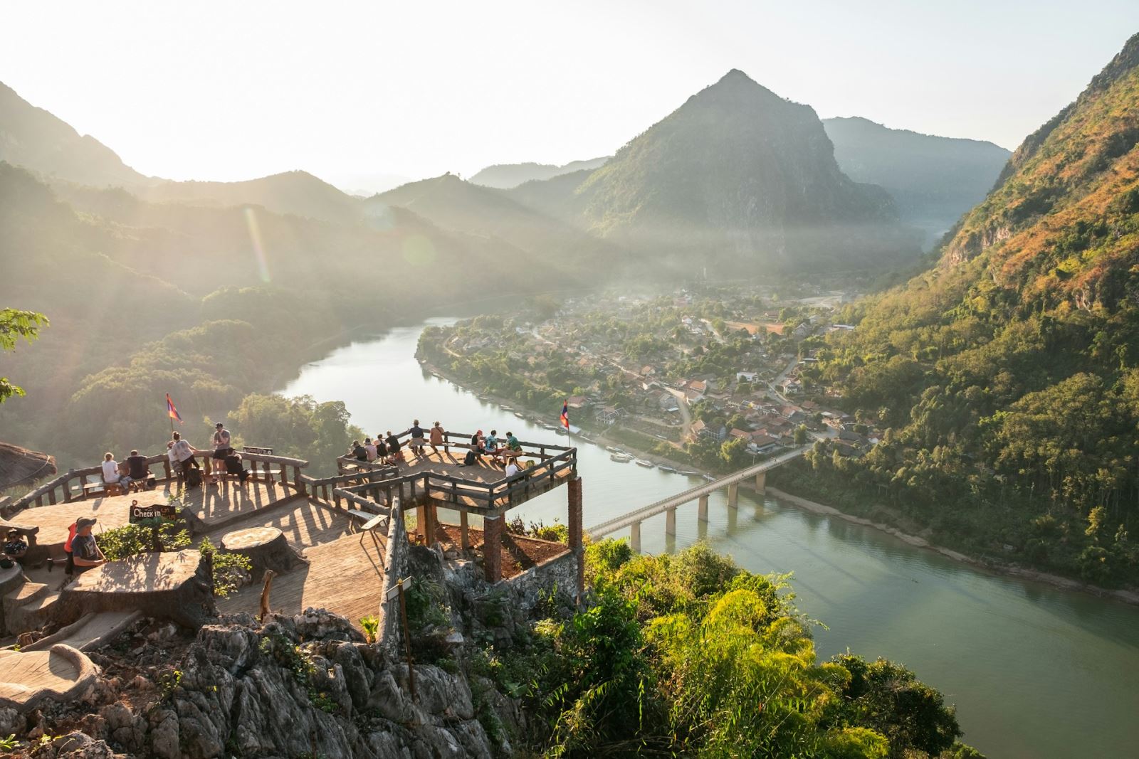 Guests watching mountain view in Nong Khiaw, Laos in January (Photos by Unsplash)